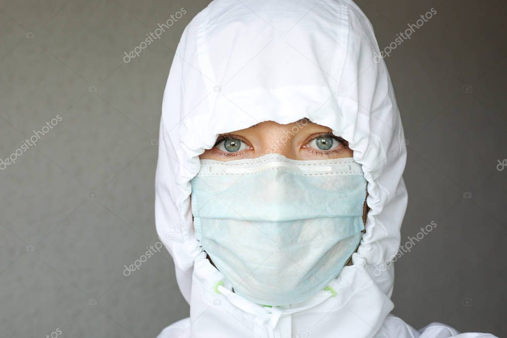 Sick woman wear a medical face mask against  corona virus and protecting herself. Self protection.