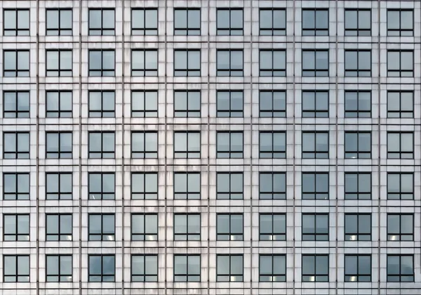 Tiro minimalista de um negócio edifícios janelas - ótimo para fundo ou um blog — Fotografia de Stock