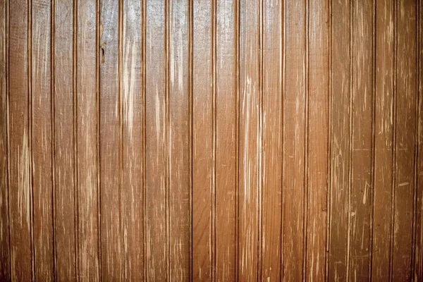 Τοίχος από κάθετες καφέ ξύλινες σανίδες - ιδανικό για ένα δροσερό φόντο ταπετσαρία — Φωτογραφία Αρχείου