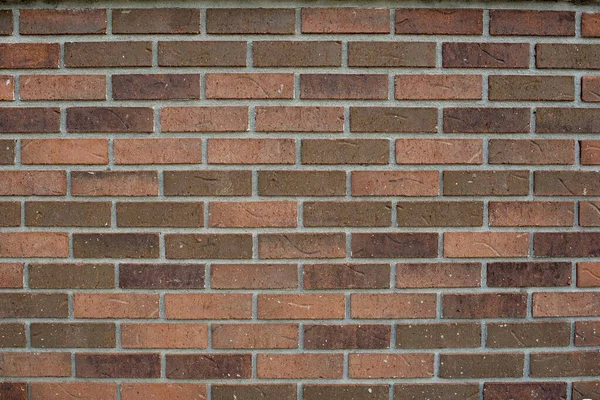Closeup tiro de uma parede de tijolo vermelho - perfeito para um papel de parede de fundo legal — Fotografia de Stock