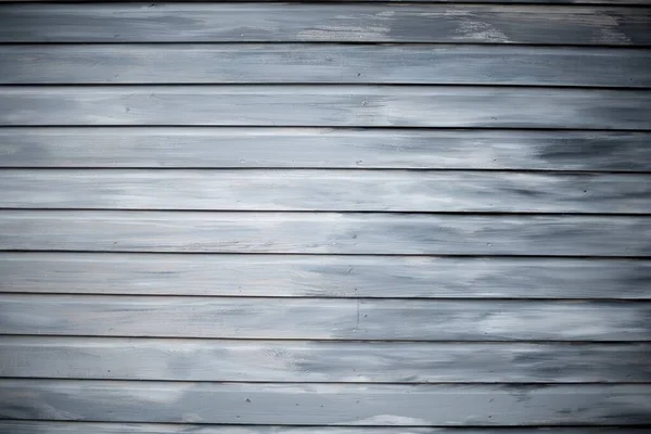 Grayscale shot of a wall made of horizontal wooden planks - perfect for cool wallpaper background — Stock Photo, Image