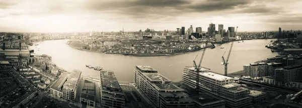 Grayscale aerial photography shot of the industrial district in London