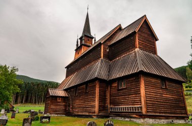 Low angle shot of the Kaupanger Stave Church in Kaupanger, Norway clipart