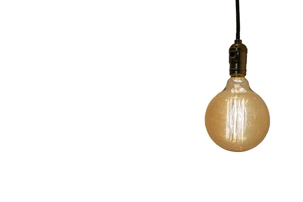 Old vintage yellow  electric lightbulb isolated on white background — Stock Photo, Image