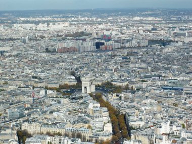 Aerial shot of Paris with modern high rise buildings and exceptional ancient architecture clipart