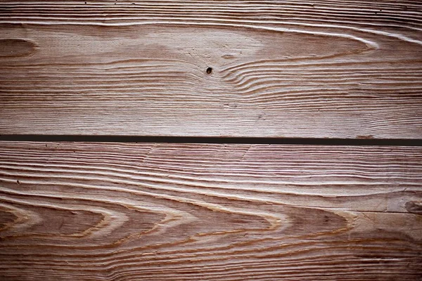 Nahaufnahme der Wand aus horizontalen braunen Holzplanken - perfekt für kühle Tapete Hintergrund — Stockfoto