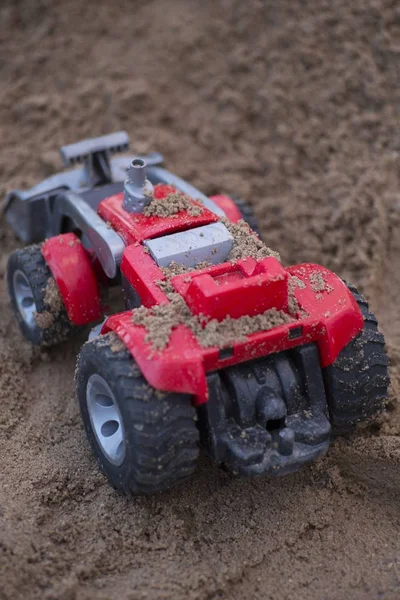 Vertical Shot Red Plastic Toy Car Sand Box Park — Stock Photo, Image