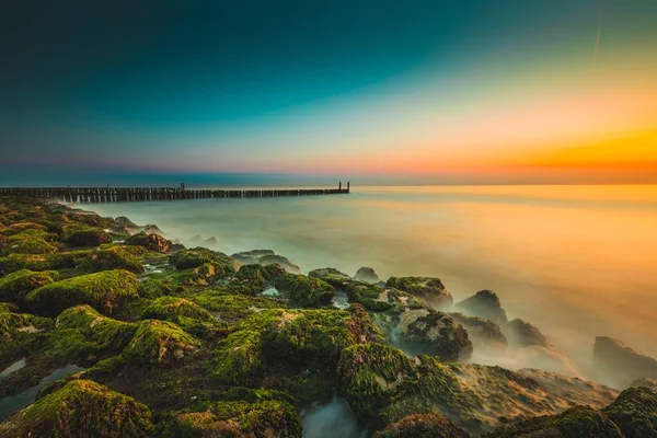 Moss Covered Stones Pier Sea Sunset Captured Westkapelle Netherlands — 스톡 사진