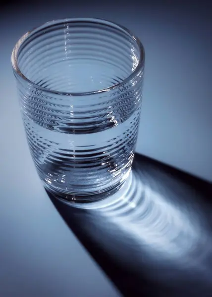 Vertical Shot Glass Cold Water Reflecting Table — 스톡 사진