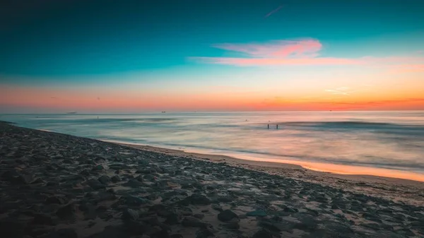 Wspaniały widok na ocean o zachodzie słońca zdobyty w Zeeland, Holandia — Zdjęcie stockowe