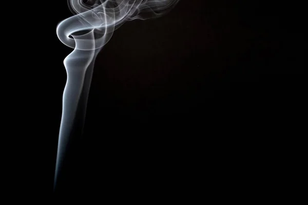 Realistic shot of a wisp of smoke against a black background - great for a cool background — Stock Photo, Image