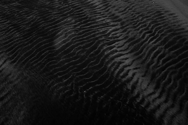 Closeup shot of a black velvet texture perfect for using as a background — Stock Photo, Image