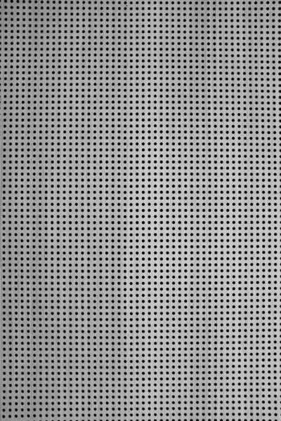 Imagen estampada con pequeños puntos negros sobre un fondo gris —  Fotos de Stock