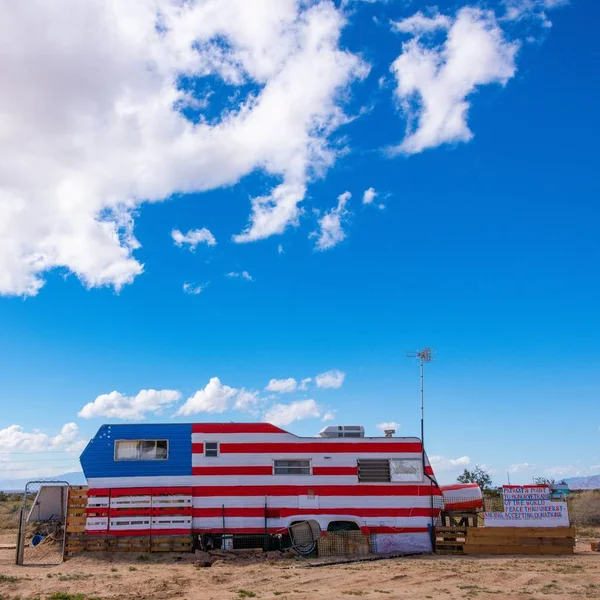 An RV painted like the American Flag.