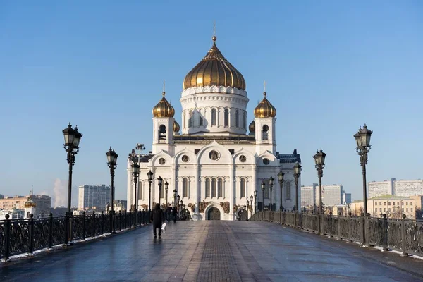 Cathedral of Christ the Savior surrounded by buildings and lamps under a blue sky — Stock Photo, Image