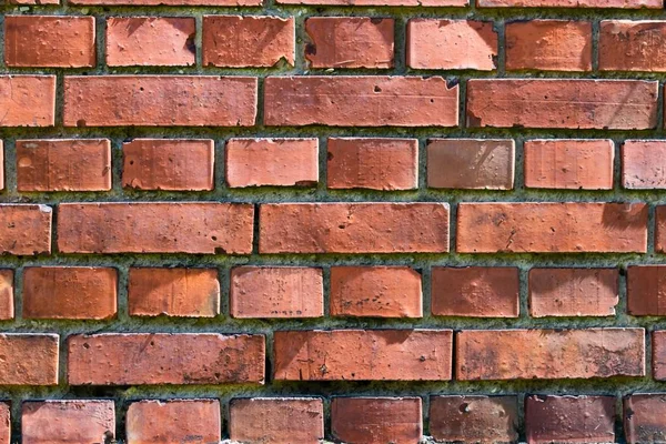 Güneş Işığı Altında Kırmızı Taş Bir Duvar Arkaplan Duvar Kağıtları — Stok fotoğraf