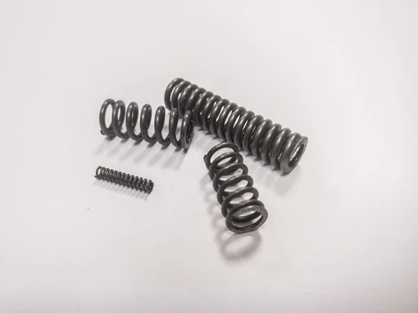 Lot Metal Mainsprings White Background — Stock Photo, Image