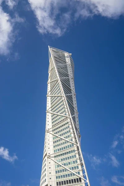 Low angle view of the Turning Torso under a blue sky and sunlight in Malmo in Sweden — ストック写真