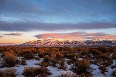 A breathtaking sunset over the Little Cedar Mountain in Nevada clipart