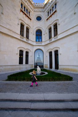 little girl strolling as a tourist in Istria, Croatia clipart