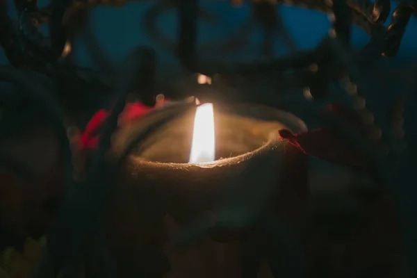 Candle Glowing While Ornamental Cage — 스톡 사진