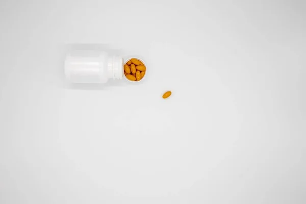 White Pill Bottle Orange Pills Lid White Background — 스톡 사진