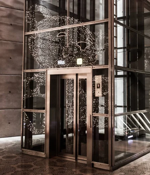 A vertical shot of an elevator inside the building