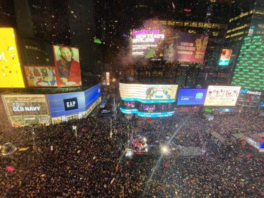 NEW YORK, UNITED STATES - Dec 31, 2019: Thousands of people waiting for a Ball Drop in NYC, Times Square clipart