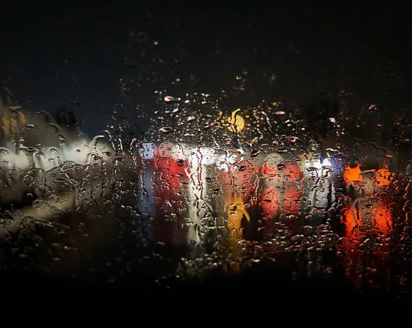 Waterdrops Window Blurring Lights Black Background — Stock Photo, Image