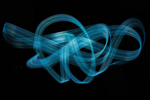 ゆっくりとしたシャッタースピードで作成されたカラフルなライトの美しい鮮やかな背景を作った — ストック写真