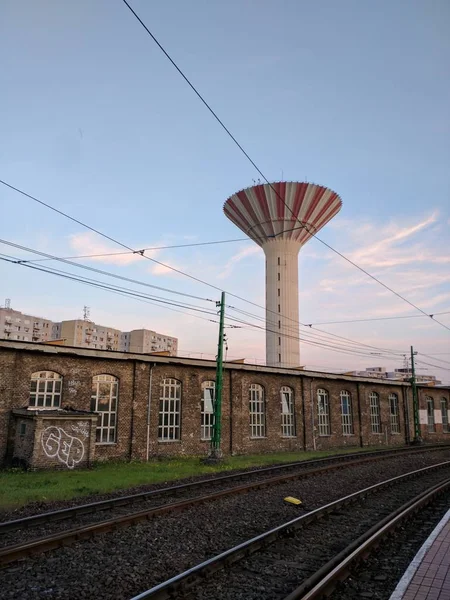 Water tower by the train station — 스톡 사진