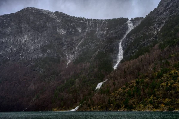 Natural waterfall on the Naeroyfjord mountain in Norway — Stock Photo, Image