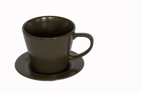 Eine Braune Tasse Auf Einer Untertasse Unter Dem Licht Vor — Stockfoto