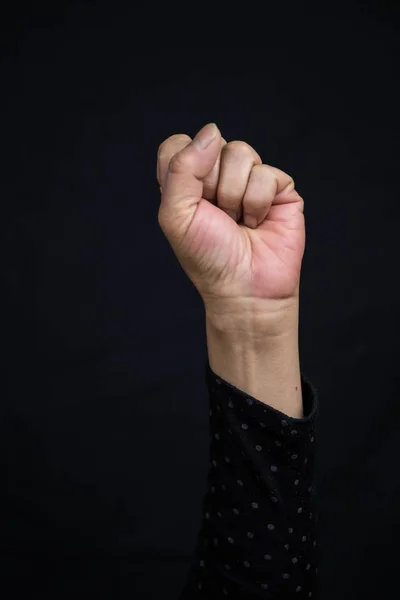 Vertical Shot Asian Female Holding Her Fist Sign Strength Women — 스톡 사진