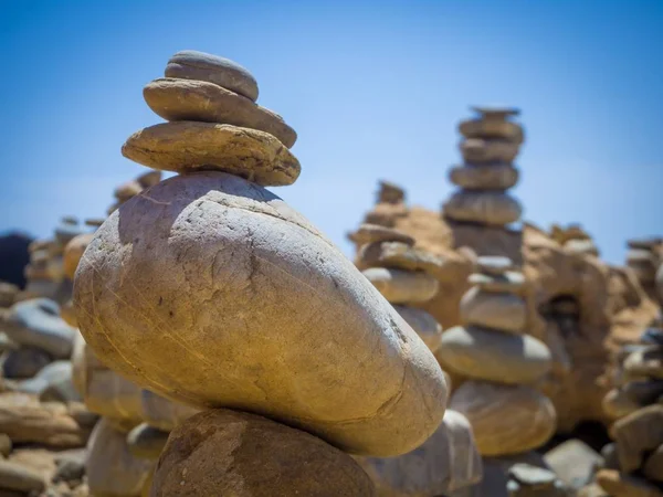 Closeup shot of stacks of stones - business stability concept — Stock Photo, Image