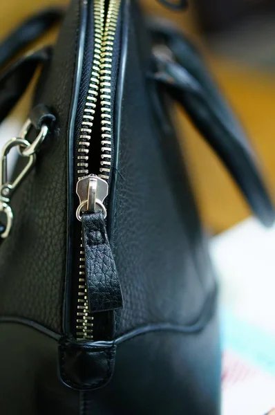 Vertical shot of an open black purse — Stock Photo, Image