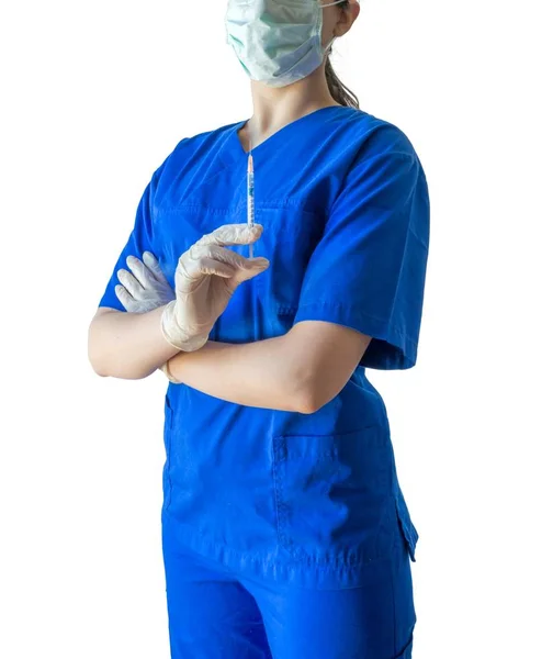 Ung kvinnlig läkare i medicinsk uniform och handskar som tryggt håller sprutan för injektion — Stockfoto