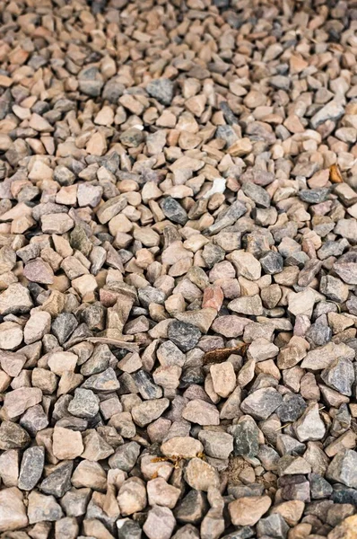 Vertical closeup shot of a gravel ground - perfect for a cool wallpaper — Stock Photo, Image