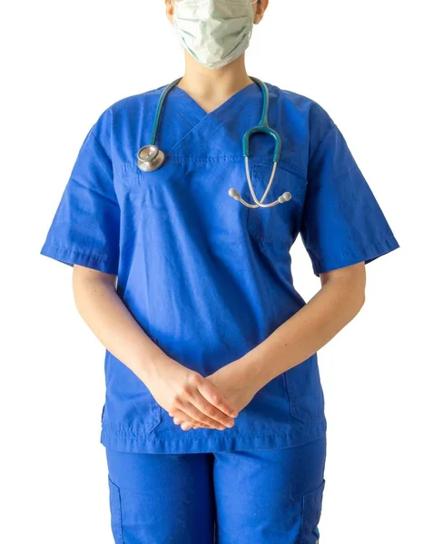 Retrato de una joven doctora en uniforme médico azul y máscara aislada sobre fondo blanco — Foto de Stock