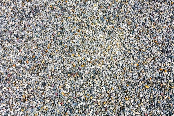 Textur aus farbenfrohen Natursteinen aus Strandkiesel — Stockfoto