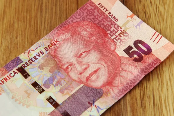 High angle shot of a South African 50 rand bill on a wooden surface — Stock Photo, Image