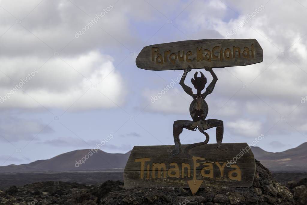 TIMANFAYA, SPAIN - Apr 01, 2019: Parque nacional de Timanfaya - symbolic sculpture of the devil designed by Cesar Manrique, emblem of Timanfaya, Lanzarote . Timanfaya Fire Devil.