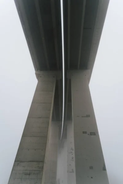 Vertical Low Angle View Concrete Bridge Background Covered Fog — 스톡 사진