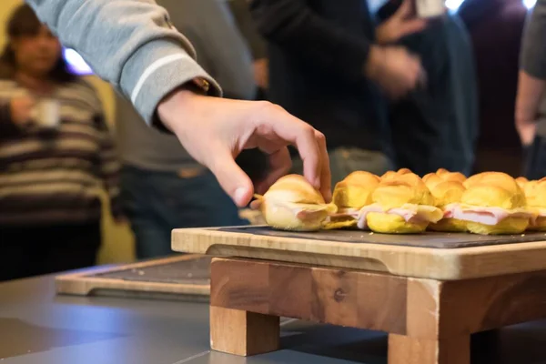 Closeup Shot Person Grabbing Delicious Ham Slider — ストック写真