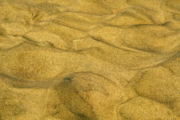 Closeup shot of different patterns made out of the sand — Stock Photo, Image