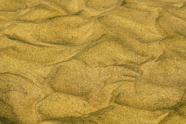 Closeup shot of different patterns made out of the sand — Stock Photo, Image