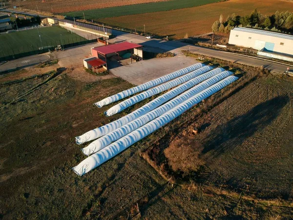 Aerial Picture Fivr Log Cylinders Wrapped Forage — Stock Photo, Image