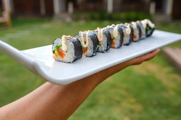 Closeup Shot Someone Holding Tray Different Types Sushi — Stock Photo, Image