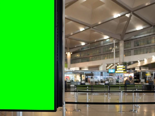 Closeup shot of a display board with a green space for your image in an airport — Stock Photo, Image