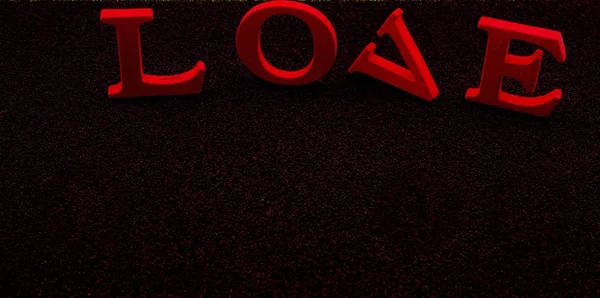 Фото блоків червоної літери, що вимовляють "любов", ізольовані на чорному тлі — стокове фото
